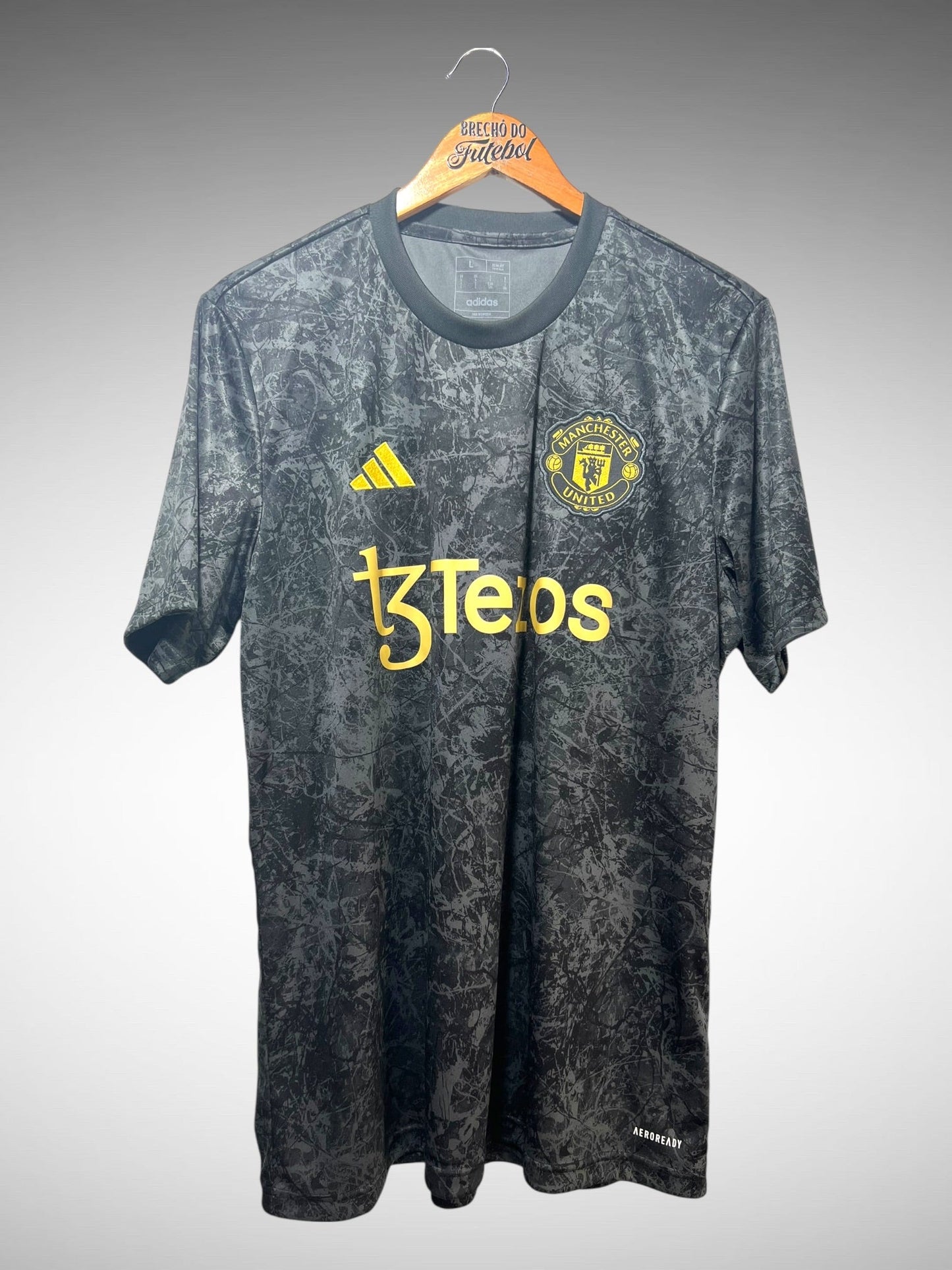 Manchester United 2023 Camisa Pré-Jogo Tam G.